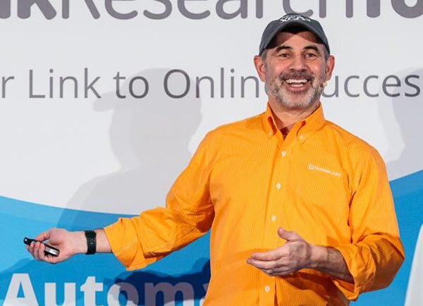 Grant Simmons presenting on stage